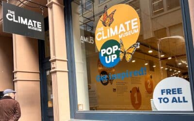 A passer-by looks at the front of the pop-up site of the Climate Museum in Soho, New York city.
