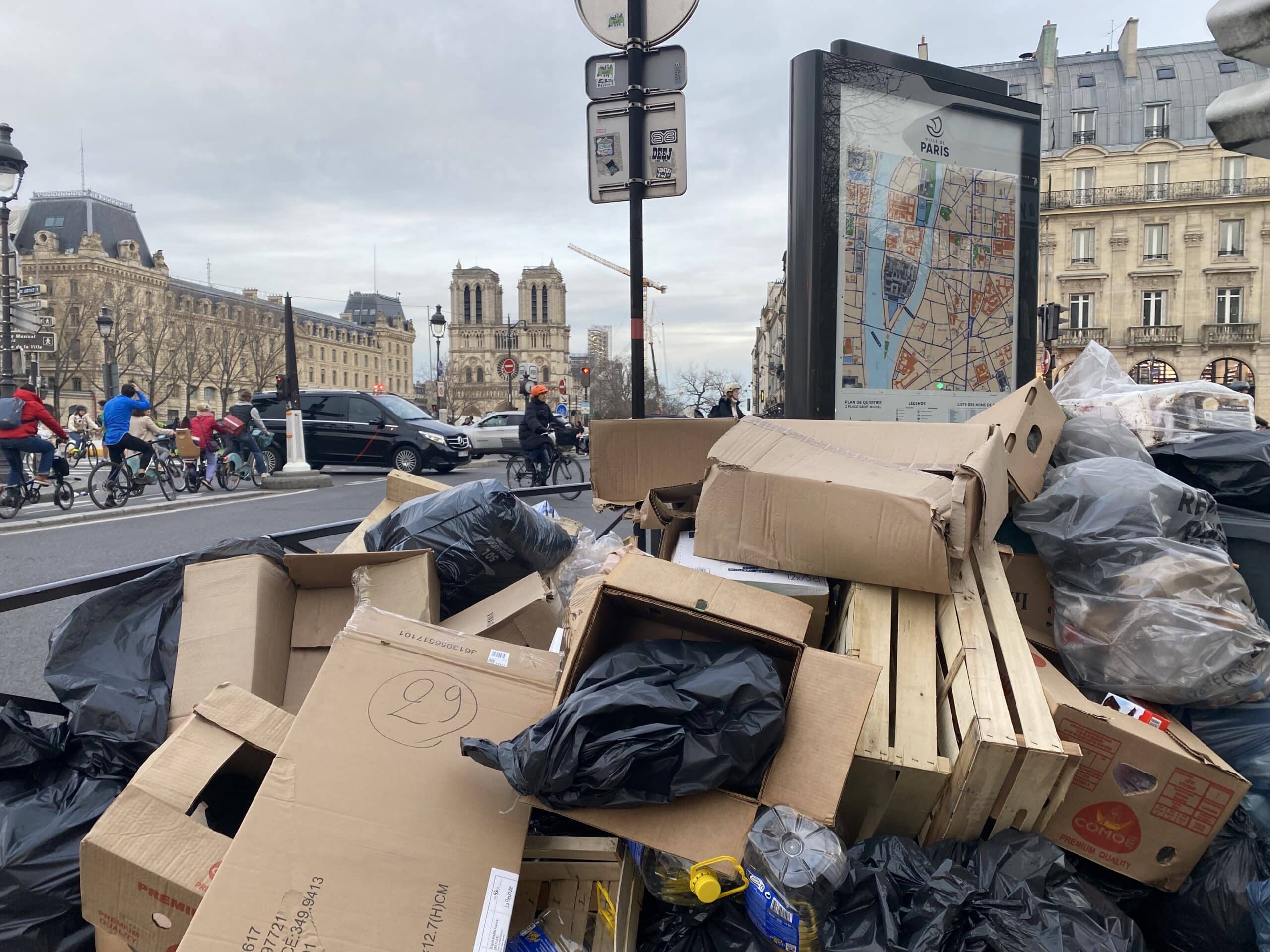 Trash meters away from the Notre Dame in Paris